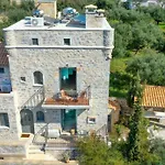 Casa de hóspedes Mani Stone Towers